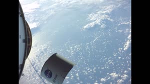 Orion Solar Array Wing #4 View of Spacecraft Adapter Jettison Fairing Panels Separating